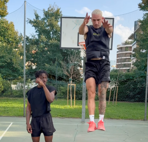 Dunk Elite professional dunkers performing high-flying basketball dunks